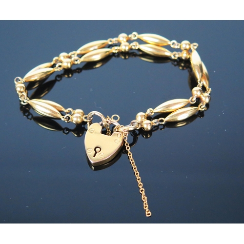 73 - 9ct Gold Bracelet with fancy links, c. 7