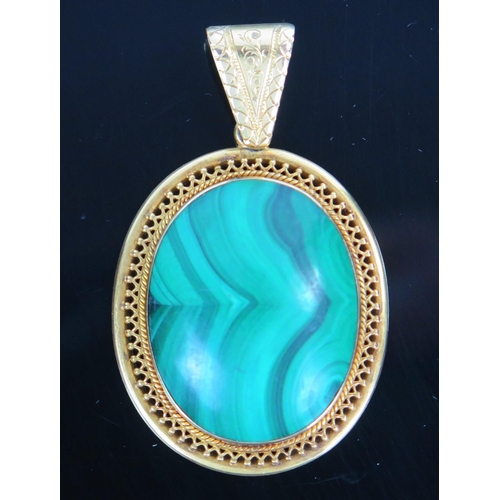 75 - Malachite Pendant in an unmarked 15ct gold setting, c. 50mm drop, 14.2g