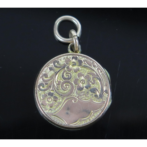 83 - 9ct Gold Circular Locket with chased foliate decoration, c. 19mm diam., 2.5g