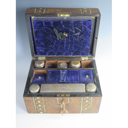 661 - A late Victorian ladies dressing case, burr walnut and parquetry inlaid with mother of pearl, fitted... 