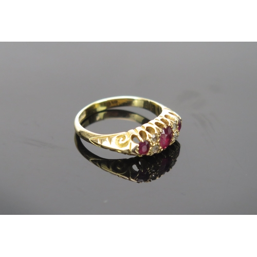 10 - Ruby and Old Cut Diamond Ring in an 18ct gold setting, central stone 4.7x4.1mm, size M.25, 4.4g