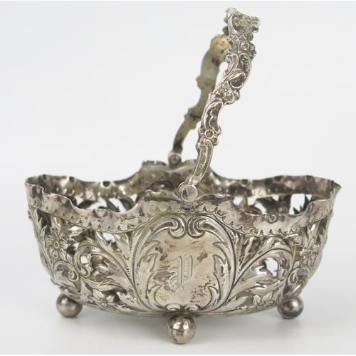 109 - Victorian Silver, Embossed and Pierced Swing Handled Oval Basket, decorated with acanthus leaves and... 