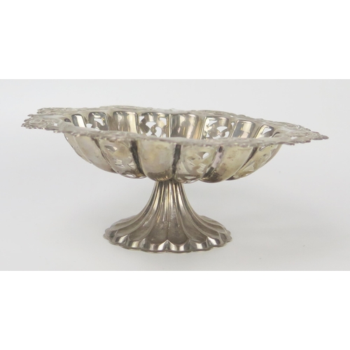 111 - Edward VII Pierced Silver Shaped Circular Dish with foliate scroll rim and raised and on a lobed foo... 