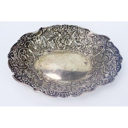 117 - Victorian Silver Shaped Oval Dish with embossed foliate scroll decoration, 23x17.5cm, Chester 1894, ... 