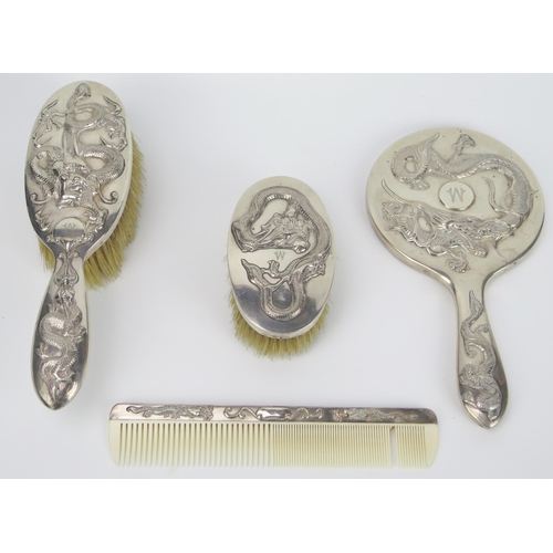 136 - Chinese Matched Silver Backed Hand Mirror and Brush Set