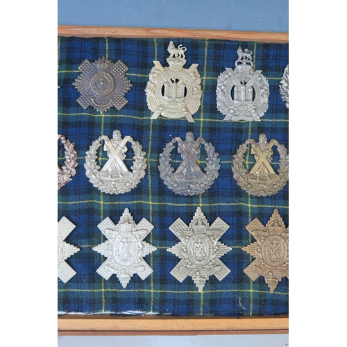 145 - Collection of Military Helmet and Cap badges including The Royal Scots, Black Watch, King's Own Scot... 