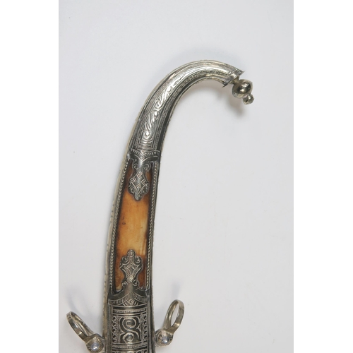 156 - Moroccan Koummya Knife with white metal and bone mounts, 26cm long including sheath