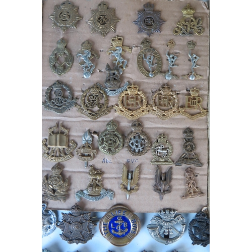 169 - Large Selection of Military Cap Badges including Monmouth Regiment of Welsh Guards, 1st Royal Devon ... 