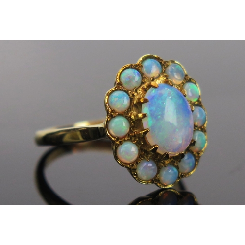 17 - Opal Cluster Ring in a 9ct hallmarked setting, 17x14.5mm head, size P.25, 3.6g