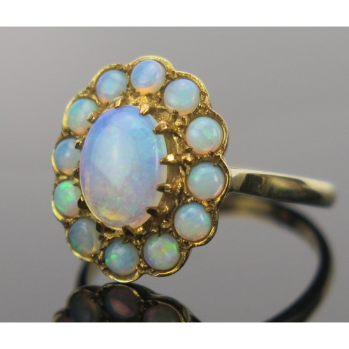 17 - Opal Cluster Ring in a 9ct hallmarked setting, 17x14.5mm head, size P.25, 3.6g