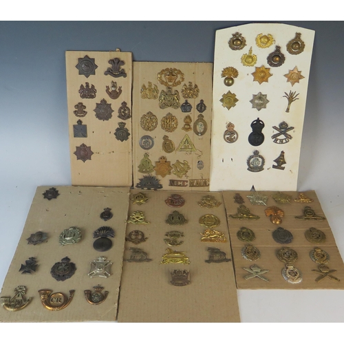 171 - Collection of Military Cap Badges including R.N.D., Royal Marines, Navy, Scottish King's Borderers, ... 