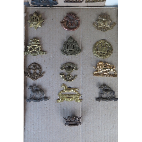 171 - Collection of Military Cap Badges including R.N.D., Royal Marines, Navy, Scottish King's Borderers, ... 