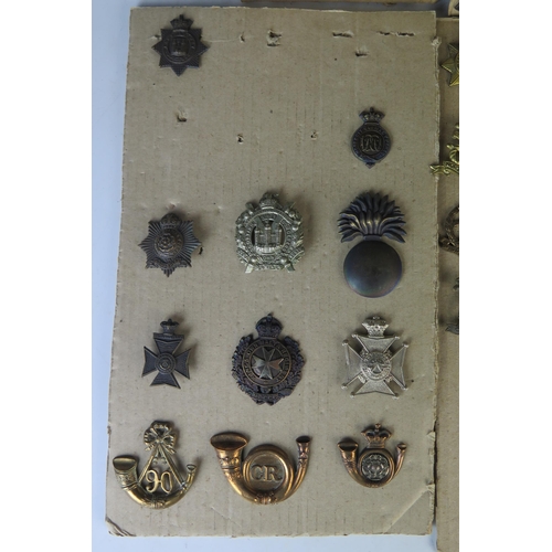 171 - Collection of Military Cap Badges including R.N.D., Royal Marines, Navy, Scottish King's Borderers, ... 