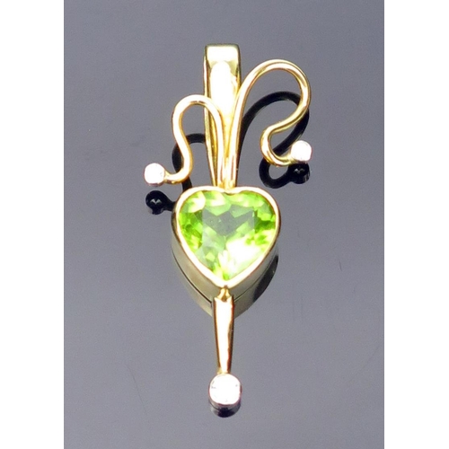 18 - Peridot and Diamond Pendant in an 18ct hallmarked gold setting, 34.5mm drop, 4.2g