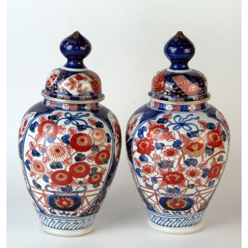 240 - Pair of Imari Palette Cases and Covers, the oversize globular finials above domed the domed lid, the... 