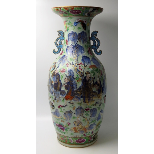 244 - Large Chinese Famille Rose Vase, the central decoration depicts figures collecting butterflies and i... 