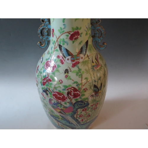 244 - Large Chinese Famille Rose Vase, the central decoration depicts figures collecting butterflies and i... 