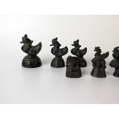 245 - Thirteen Burmese Bronze Opium Weights, eight duck weights the largest 6.4cm, five elephant weights.