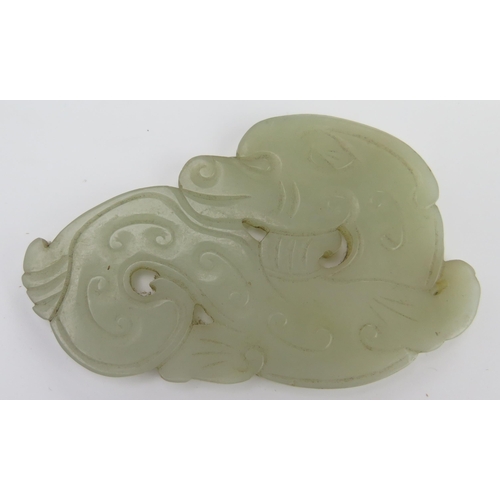 249 - Chinese Pale Green Grey Jade of a mythical beast, 8x5.3cm.