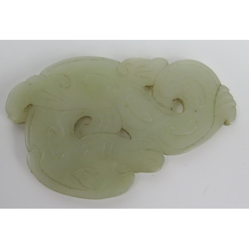 249 - Chinese Pale Green Grey Jade of a mythical beast, 8x5.3cm.