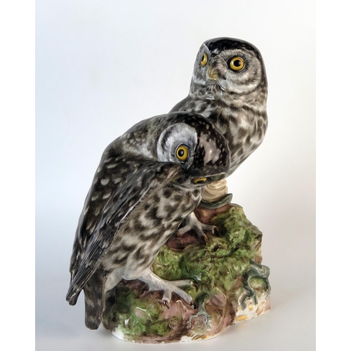 266 - Late 19th Century Meissen Bird Group modelled as a pair of owls sitting on a rocky outcrop,  blue cr... 