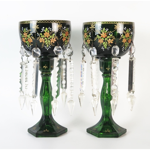 271A - A pair of 19th Century Green Glass Lusters, of goblet form, decorated with green, pink and white ena... 