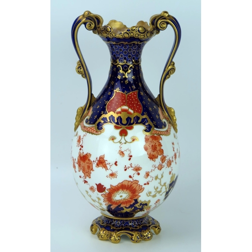 281 - Late 19th Century Royal Crown Derby two handle baluster vase in the Imari palette, 26cm high.