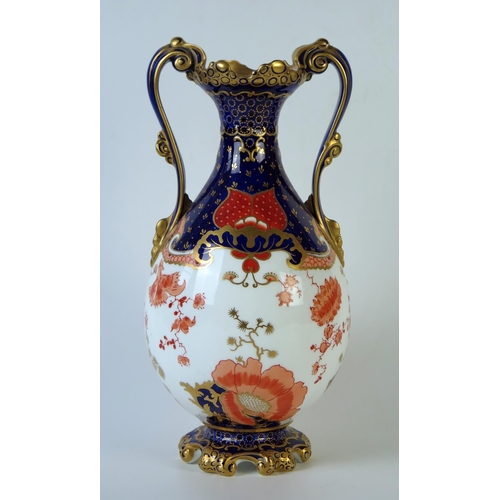 281 - Late 19th Century Royal Crown Derby two handle baluster vase in the Imari palette, 26cm high.