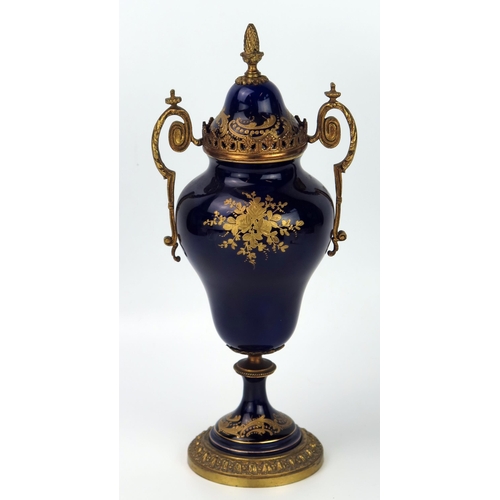 285 - A 20th Century Serves Style Case and Cover with gilt metal mounts, pseudo marks, 32cm high.