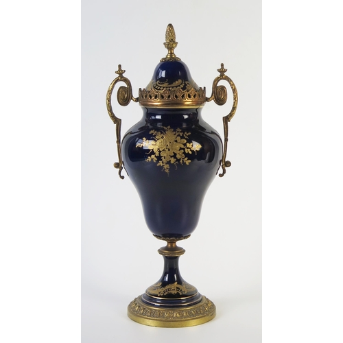 285 - A 20th Century Serves Style Case and Cover with gilt metal mounts, pseudo marks, 32cm high.