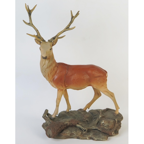 302 - Beswick Connoisseur Red Stag standing on a rocky out crop, oval gold mark Beswick England, black num... 