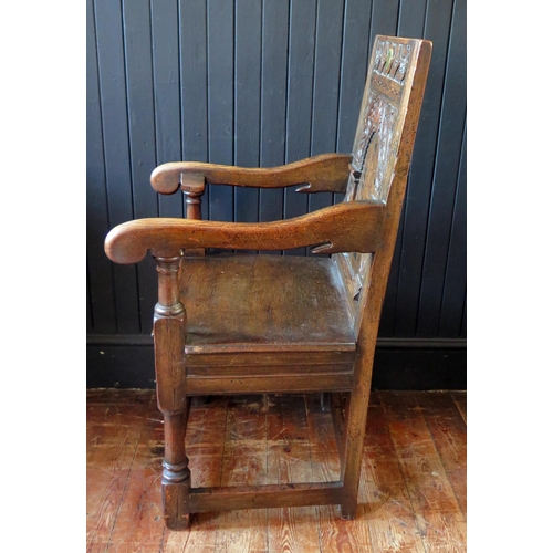 405 - 17th Century Style Oak Panel Back Armchair, carved Arcadian back inlaid central decoration, 59cm wid... 