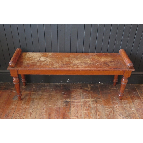 408 - A late 19th Century oak window/ hall bench, raised on turned tapering legs, 51x121x34cm.