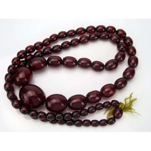 41 - Faux Cherry Amber Oval Bead Necklace, 39