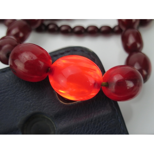 41 - Faux Cherry Amber Oval Bead Necklace, 39