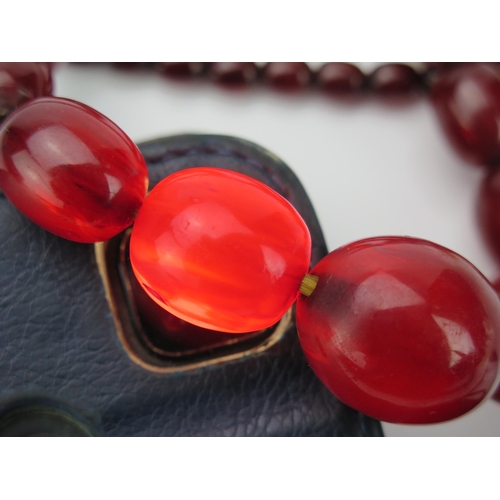 41 - Faux Cherry Amber Oval Bead Necklace, 39