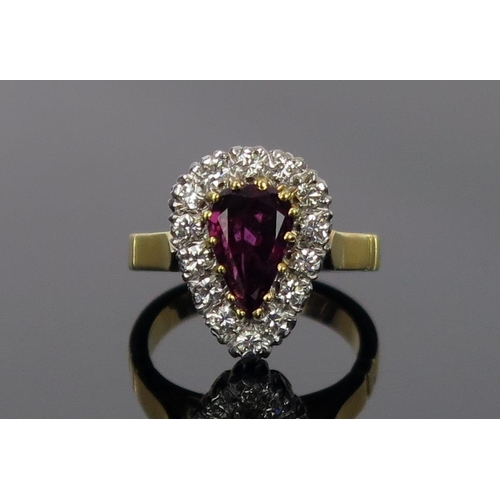 6 - Armandine Garnet? and Diamond Pear Shaped Ring in an unmarked high carat gold setting, 14.2x11mm hea... 