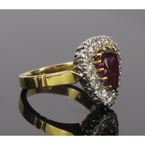 6 - Armandine Garnet? and Diamond Pear Shaped Ring in an unmarked high carat gold setting, 14.2x11mm hea... 