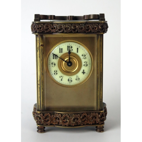 60 - A late 19th century French brass carriage timepiece, with 5cm Arabic dial, the single train movement... 