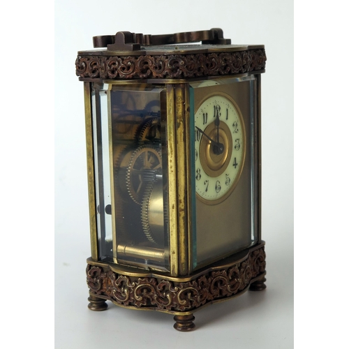 60 - A late 19th century French brass carriage timepiece, with 5cm Arabic dial, the single train movement... 