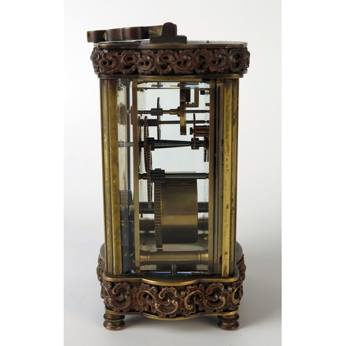 60 - A late 19th century French brass carriage timepiece, with 5cm Arabic dial, the single train movement... 