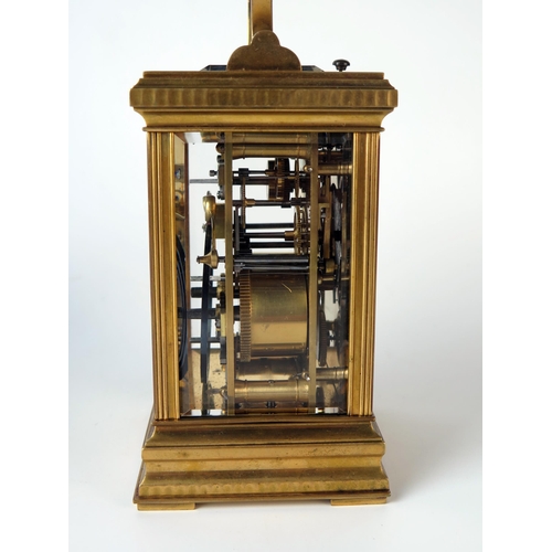 64 - A late 19th century French brass carriage clock, with 8cm Roman dial with subsidiary alarm dial, the... 