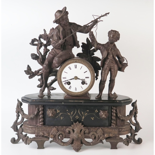 69 - A late 19th century bronzed metal figural mantel clock, the 8cm enamelled Roman dial, contained in a... 