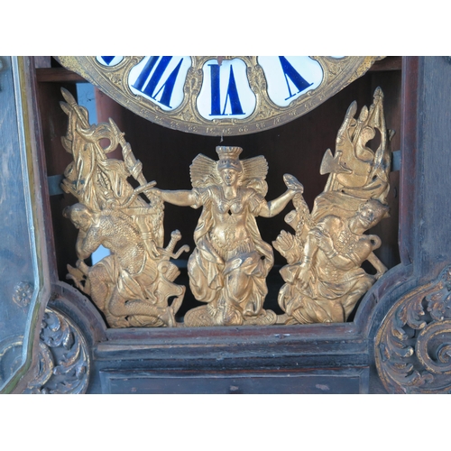 73 - A 19th century French mantel clock, of rectangular outline, decorated with caryatids and flaming urn... 