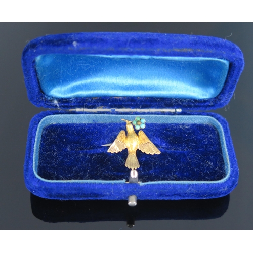 1005 - A Victorian yellow gold sweetheart brooch, in the form of a dove carrying a flower of turquoise, 16m... 