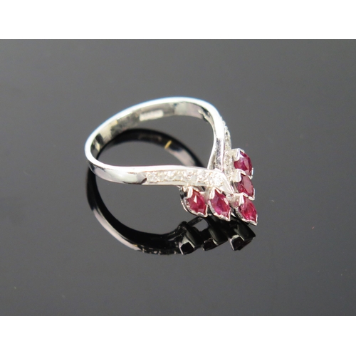 1044 - A White Metal and Synthetic Ruby ring, with zircon chips, 2.8g total, ring size approximately M-N.