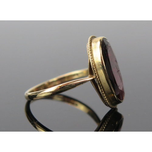 1057 - Modern 9ct Gold and Garnet Ring, size Q.5, 3.1g