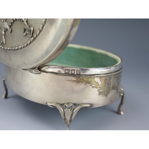 1119 - An Edward VII silver jewellery casket, maker William Comyns Sons, London, 1905, initialled, of oval ... 