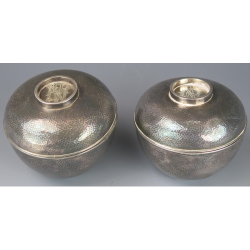 1138 - A pair of Japanese Konoike silver jars and covers, initialled, of ovoid form, stamped to the base, '... 