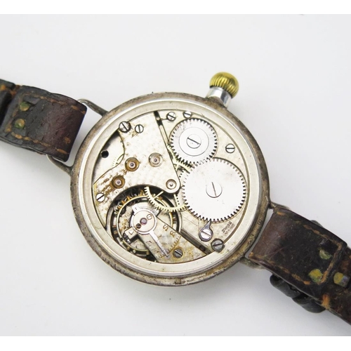 1254 - A gents steel and gilt metal gents wrist watch, with 25mm Arabic dial with subsidiary seconds dial, ... 